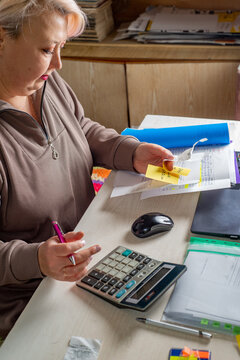 Accountant counts on a calculator