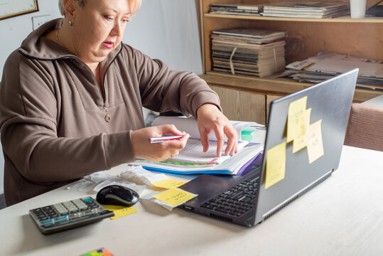Female accountant working with documents in the office