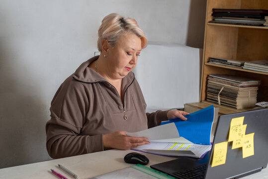 Female accountant working with documents in the office