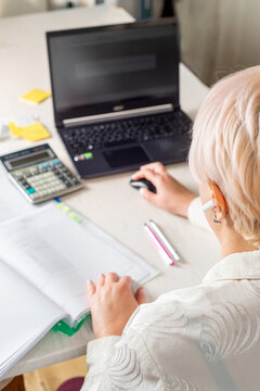 Businessman working in office with documents and office equipment