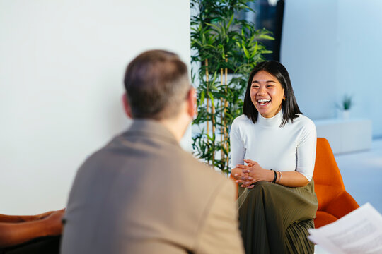Smiling businesswoman in modern office