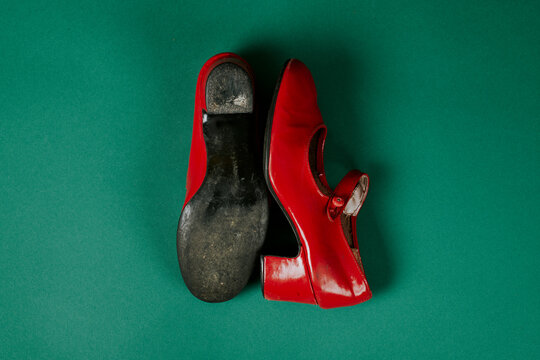 worn red flamenco shoes