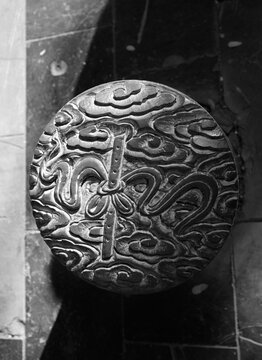 Stone carved pillars on the road in the ancient city, China