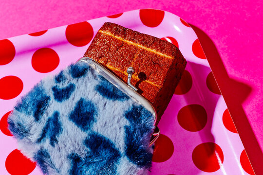 marinated tofu in a blue push purse