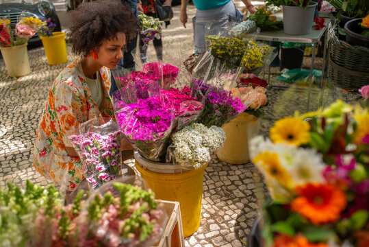 African woman shopping flowers