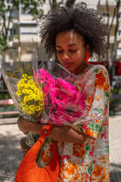 Black woman with flowers portrait