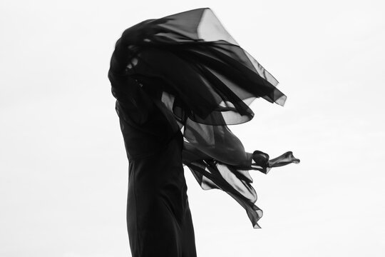 Abstract female dance on beach in sunrise