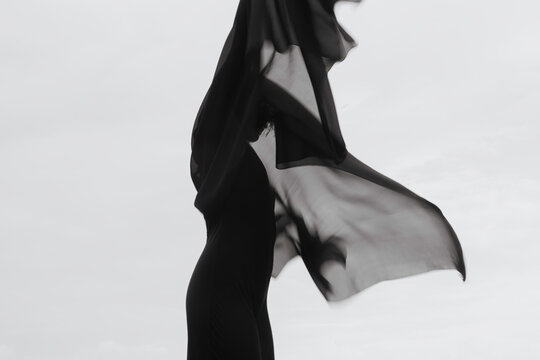 Abstract female dance on beach in sunrise
