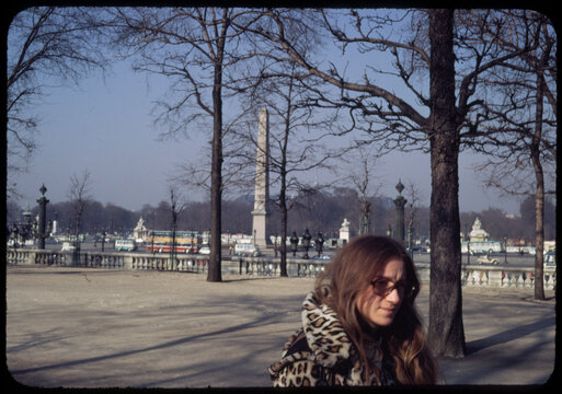 70's Old analog photo. Young tourist woman in Paris