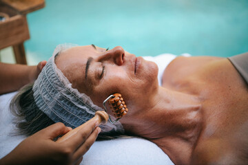 Wooden facial roller