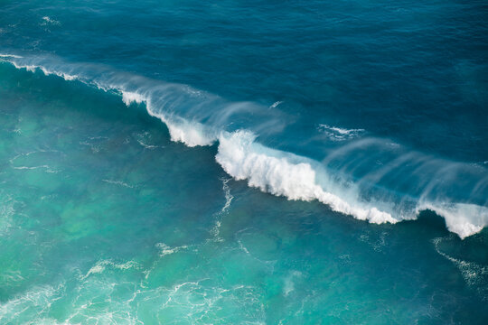 Ocean waves crashing on a sunny day in nature outdoor