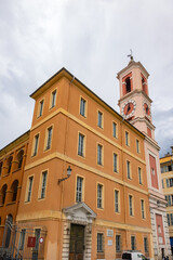 Rusca barracks (Caserne Rusca or Palais Rusca) was built in 1775 to house garrison of the city, today it is Court of Instance in Nice. Next is Clock Tower (Tour de l'Horloge, 1718). Nice, France.