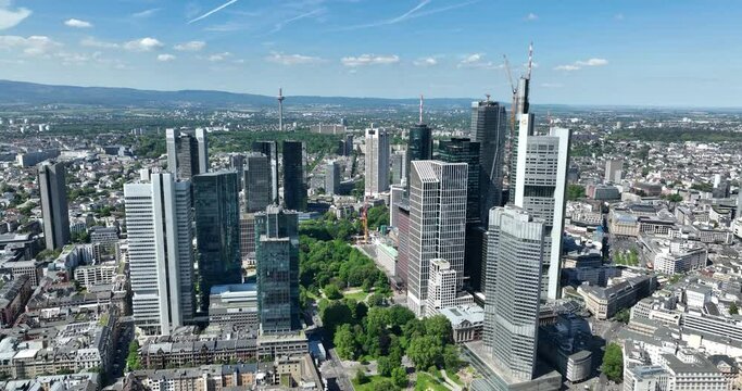 Aerial birds eye view of the cityscape of Frankfurt am Main, Germany, the skyline panorama of the Bankenviertel financial center skyscrapers during a sunny day.