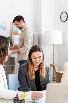 Focused Professional Reviewing Marketing Data