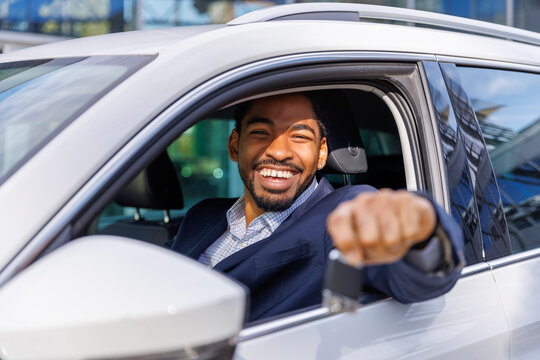 First time car owner happy to have new car keys