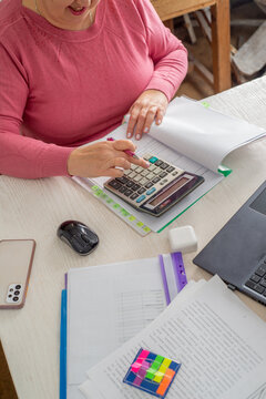 Accountant counts on a calculator