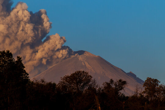 Popocatepetl volcano releasing a Fumarola at dawn