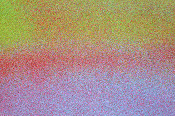 Pattern of colorful spray painting on city wall, graffiti pattern background on wallpaper and design