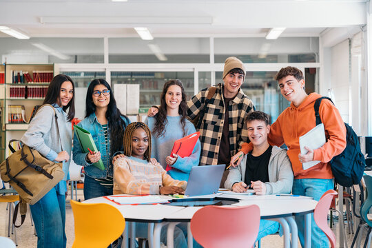 Multicultural Students Smiling in a library of university