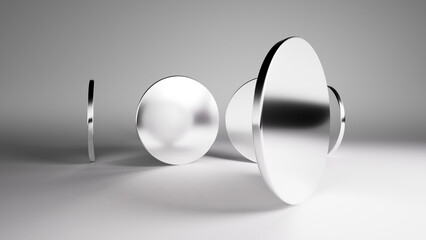 3d render. Abstract minimalist background with shiny silver geometric shapes. Round mirrors inside the empty white room, casting shadows under the studio lights. Modern wallpaper monochrome scene