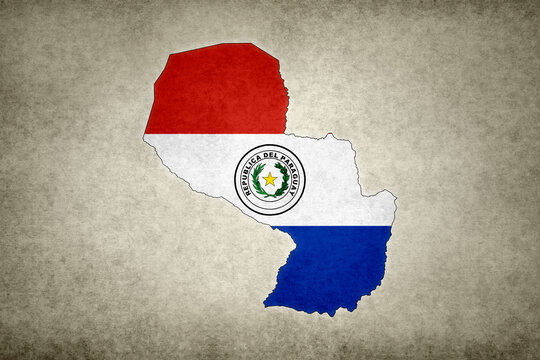 Map of Paraguay with its flag on a paper