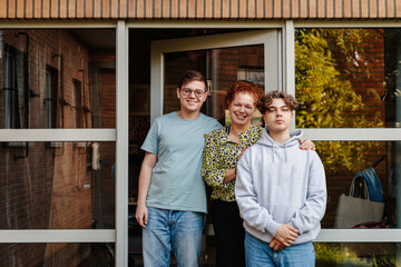 Family portrait in front of family home