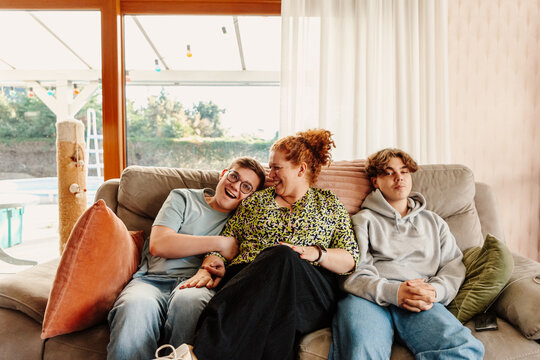 portrait of a single mother with teenagers at home