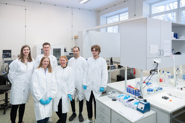 Group Photo Of Researchers In Nuclear Research Lab