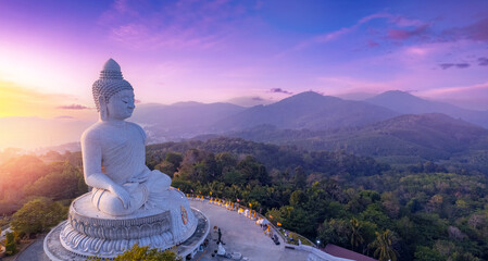 Phuket Statue big Buddha in on sunset sky, aerial top view by drone. Concept travel Thailand...