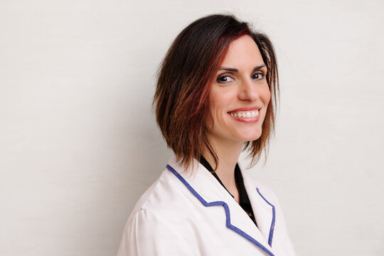 Confident female professional with a friendly smile