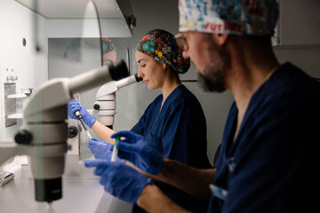 Medical professionals engaged in laboratory research