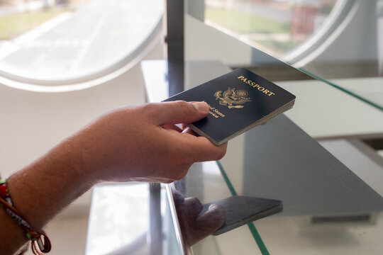Traveler Checking In with Passport and Phone