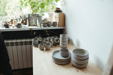 Handcrafted Pottery Display by Window