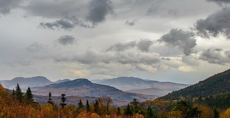 Scenic view of fall in the mountains of New Hampshire with moody sky