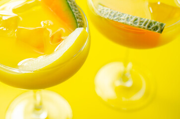 A holiday cocktail based on vodka, liqueur and fresh melon, a refreshing drink prepared by a...