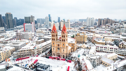 Aerial shot of the St. Michael's Church in Qingdao, Shandong Province, China on a snowy day