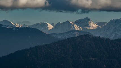 Peaks under dusk clouds