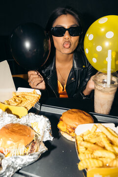 Stylish Woman at Burger Restaurant Flash UGC