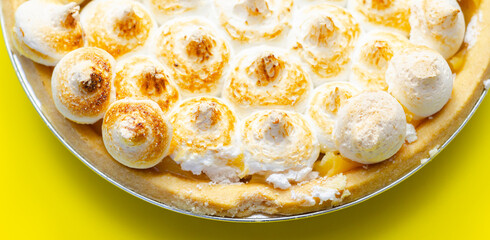 Lemon Meringue Pie, butter enriched shortcrust pastry filled with creamy lemon and topped with meringue