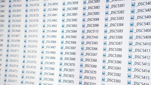 Large amount of image files on computer screen. Close up