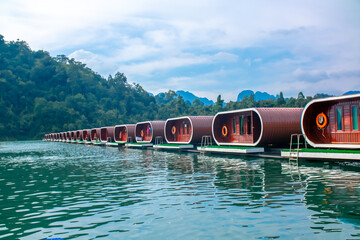 Capsule houses on the water in Thailand on Lake Cheo Lan. Water bungalows for relaxation in Khao...