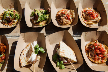 eco friendly cardboard trays with freshly made food for an event