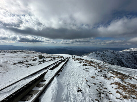 view of the train tracks from Mount Washington, in the winter 