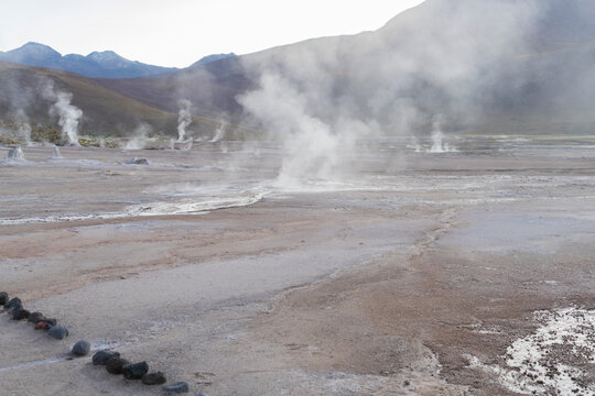 Steam Rising Out Of The Ground At The El Tatio Geyser, Atacama, Chile 