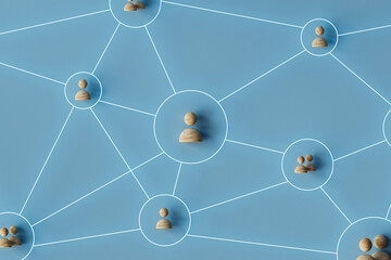 Wooden Figures on Blue Network Diagram