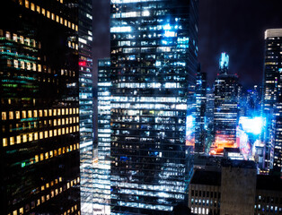 Skyscrapers at night in a city.