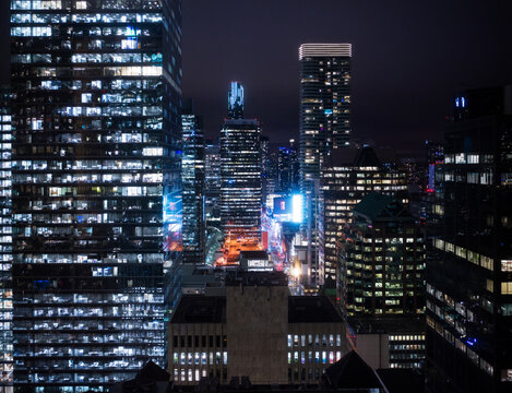 Skyscrapers at night in a city.