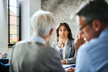 Obraz premium Worried businesswoman waiting for human resource's decision on a job interview. 