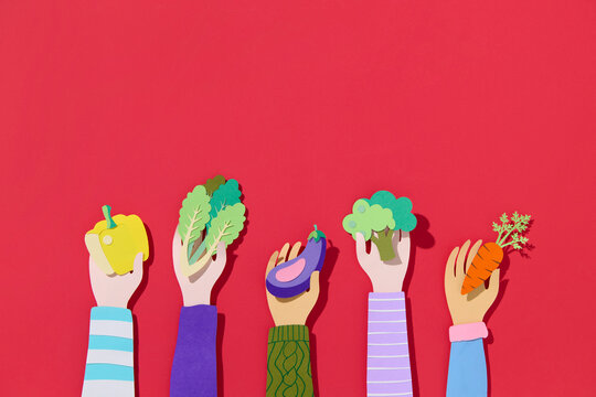 Concept of healthy food. Women's hands holding fresh vegetable