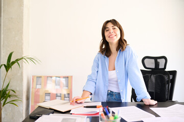 Confident Businesswoman Smiling looking at camera